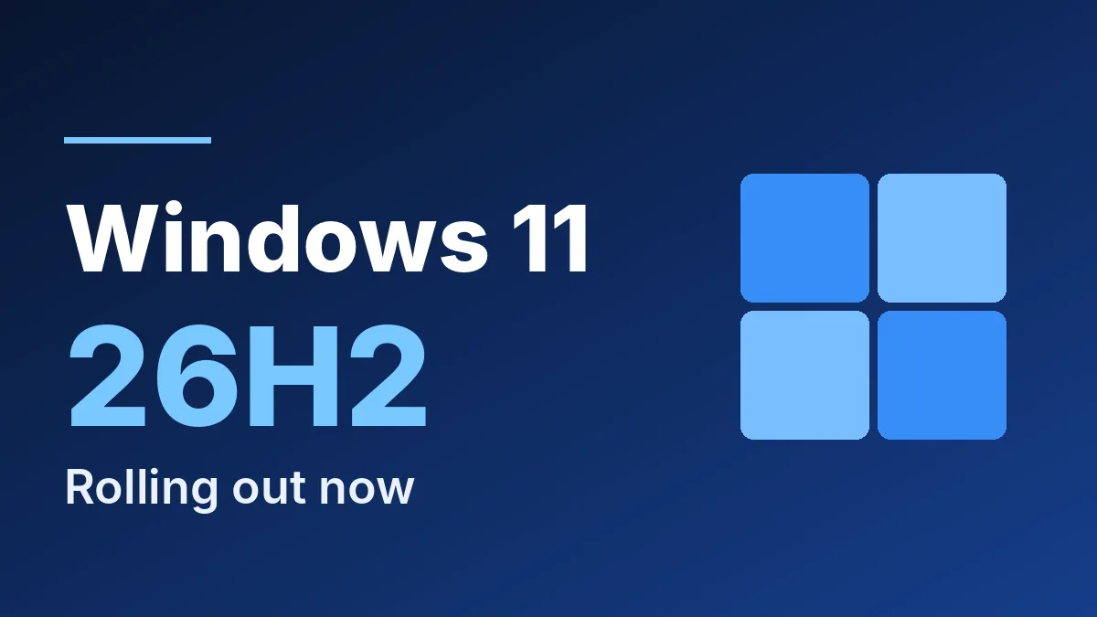 Windows 11 26H2 update rolling out now, shown with a Windows-style four-pane logo on a dark blue background